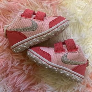 Baby Nikes size 2